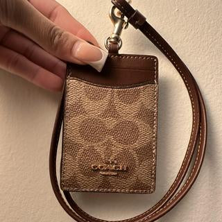 Lanyard COACH - Signature Marrón
